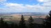 Výhled na Broumov ze Supího hnízda, na obzoru polské Soví hory.