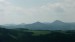 Solanská hora, siluetka Ostrého, Lipská hora, Kletečná a Milešovka.
